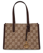Load image into Gallery viewer, Mini tote with shoulder strap and monogram pattern