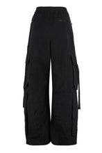 Load image into Gallery viewer, Cargo pants in coated faille