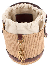 Load image into Gallery viewer, Woven bucket bag with charms
