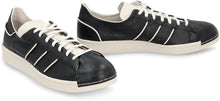 Load image into Gallery viewer, Superstar leather low-top sneakers
