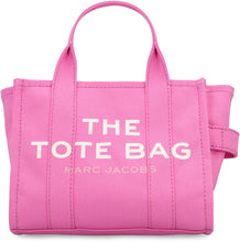 Load image into Gallery viewer, La traduzione di "The Small Tote Bag in canvas" dall'inglese (EN) all'italiano (IT) è: "La piccola borsa tote in tela".
