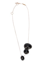 Load image into Gallery viewer, Necklace with pendant in metal and ebony wood

