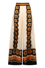 Load image into Gallery viewer, Printed silk wide-leg trousers

