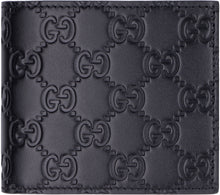 Load image into Gallery viewer, Leather wallet with GG print
