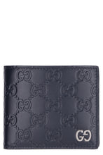 Load image into Gallery viewer, Leather flap-over wallet
