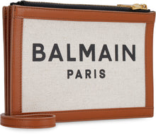 Load image into Gallery viewer, Canvas and leather clutch
